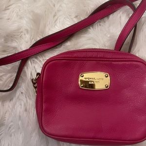 Authentic Pink Michael Kors crossbody purse with gold accents